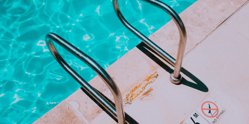 Pool with step handles