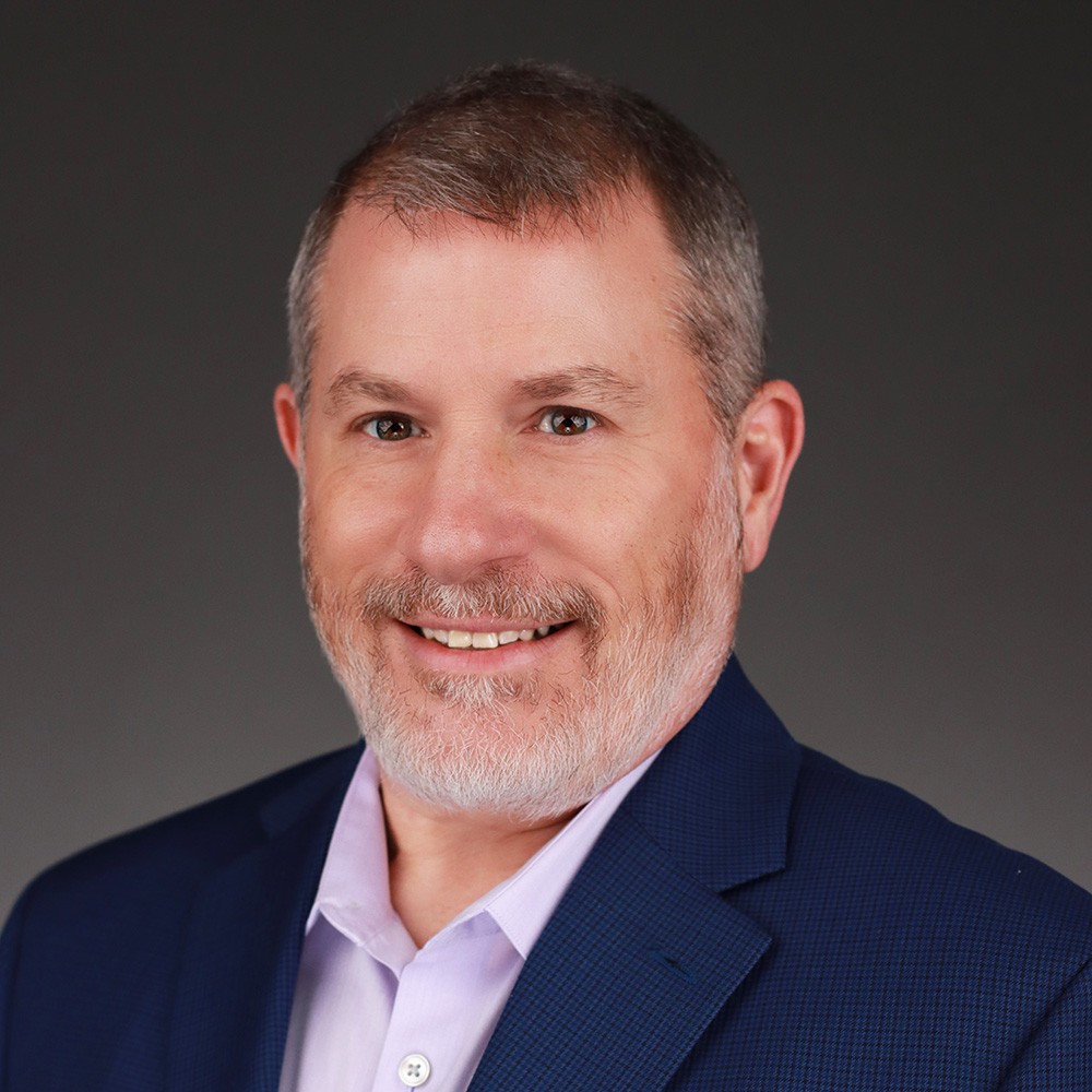 Professional headshot of Mike Flenner.