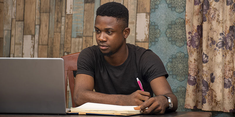 student working on laptop