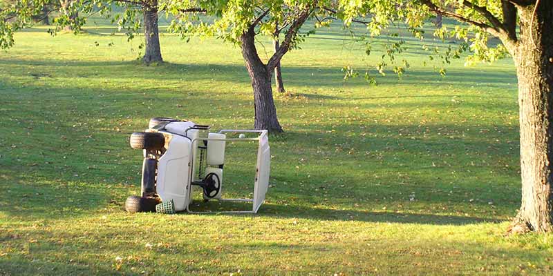 golf cart safety - golf cart flipped on side