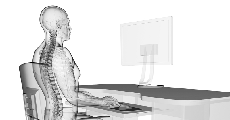 x-ray image of person sitting at desk