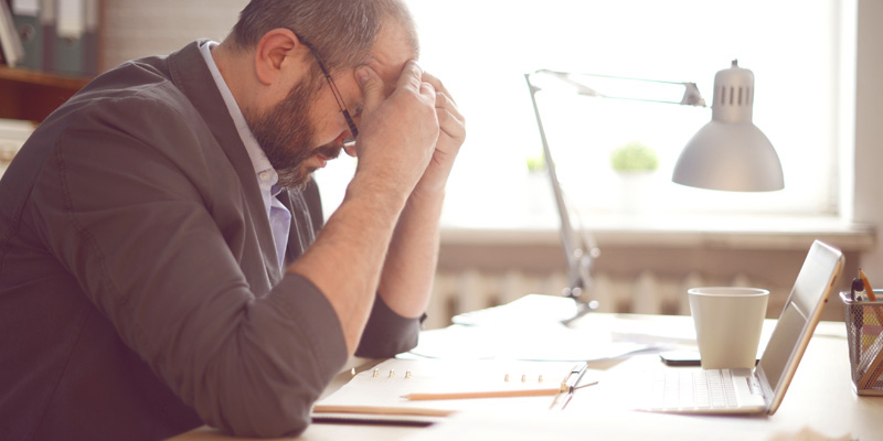 Mature adult man working in the office