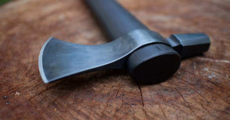 Tomahawk axe on wooden table