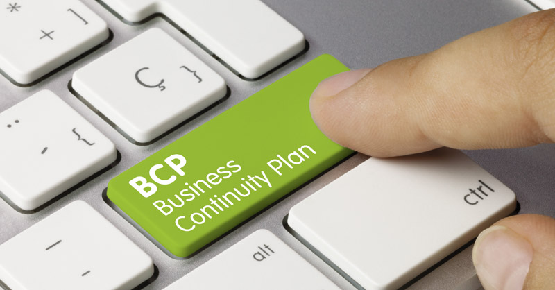 Female finger on Business Continuity Plan (BCP) keyboard
