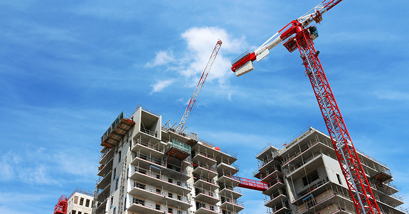 Crane at residential construction site