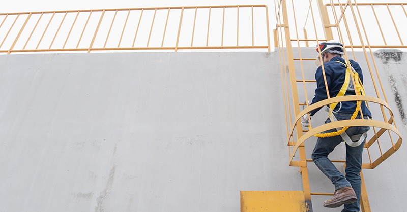 Construction Worker on Fixed Ladder