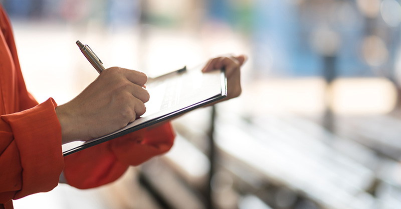 Person filling out incident report