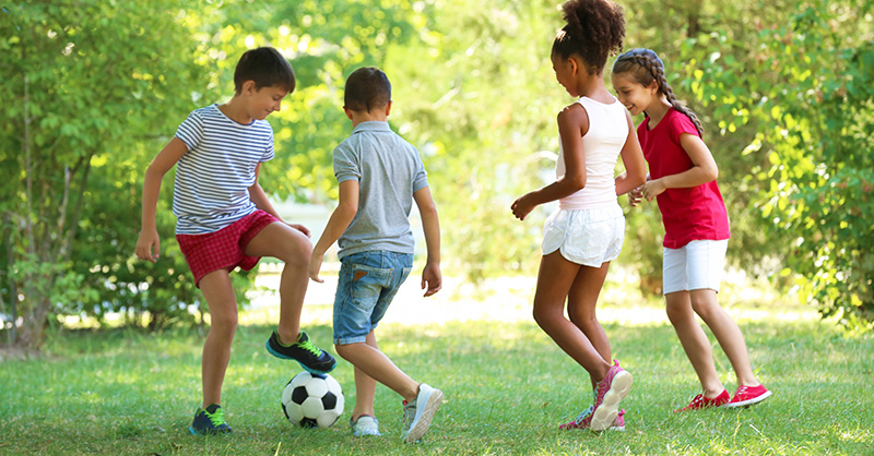 Children playing soccer