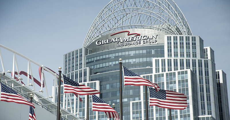 GAIG Tower with flags flowing in front