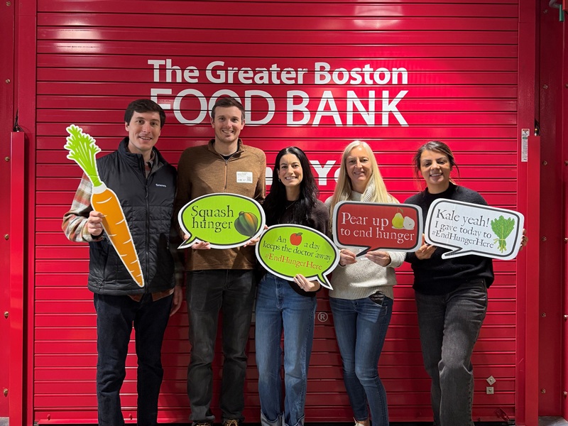 Group of people posing at a volunteer event