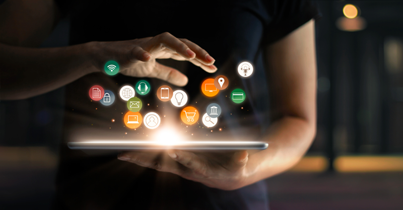 Hand over tablet with icons