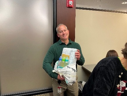 Man volunteering at food bank